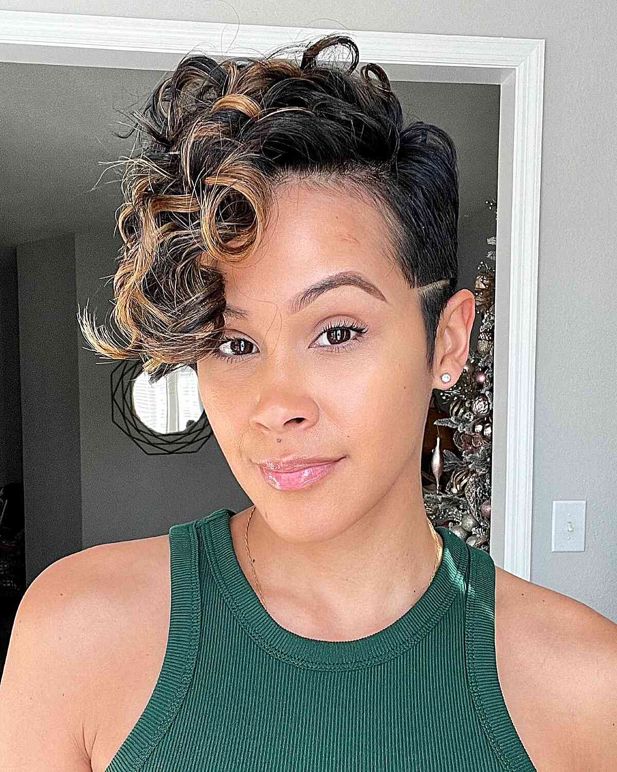 Curly Pixie Cut with a Side Part and Highlights for black ladies with relaxed hair