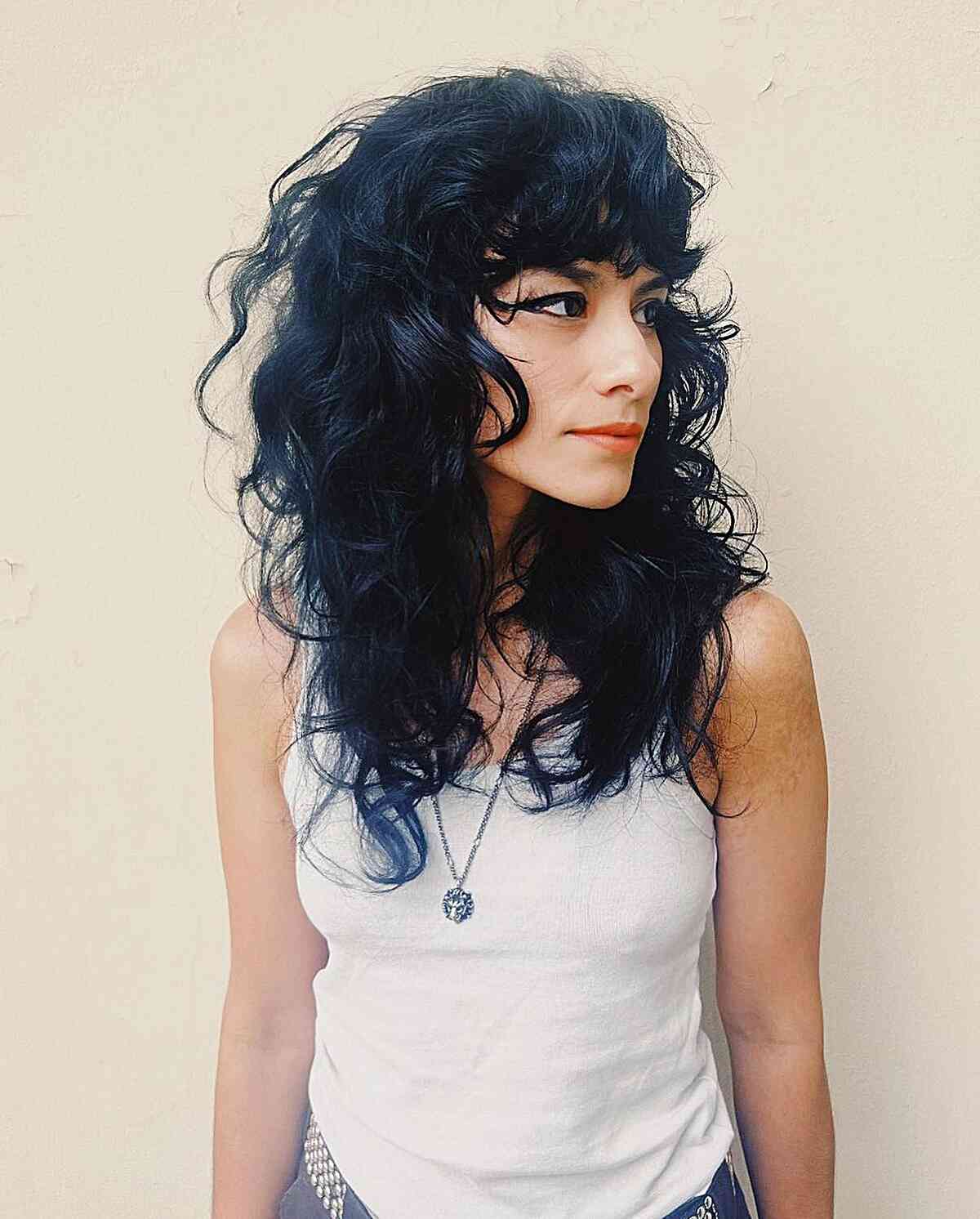 Curly Rocker Shag Cut for ladies with thick black hair