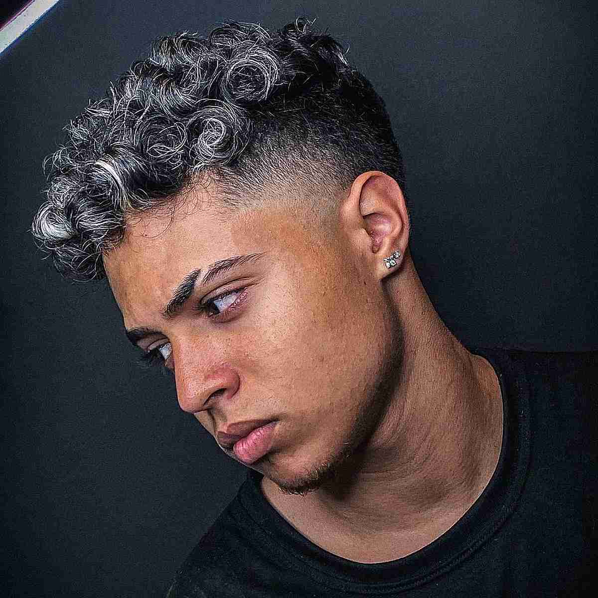 Curly Taper Fade with Highlights for Guys
