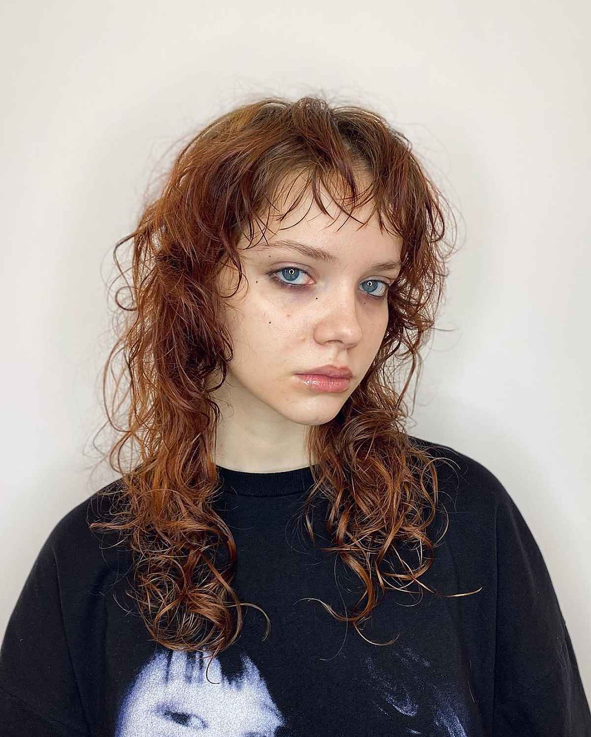 Curly Wolf Cut with Wispy Bangs