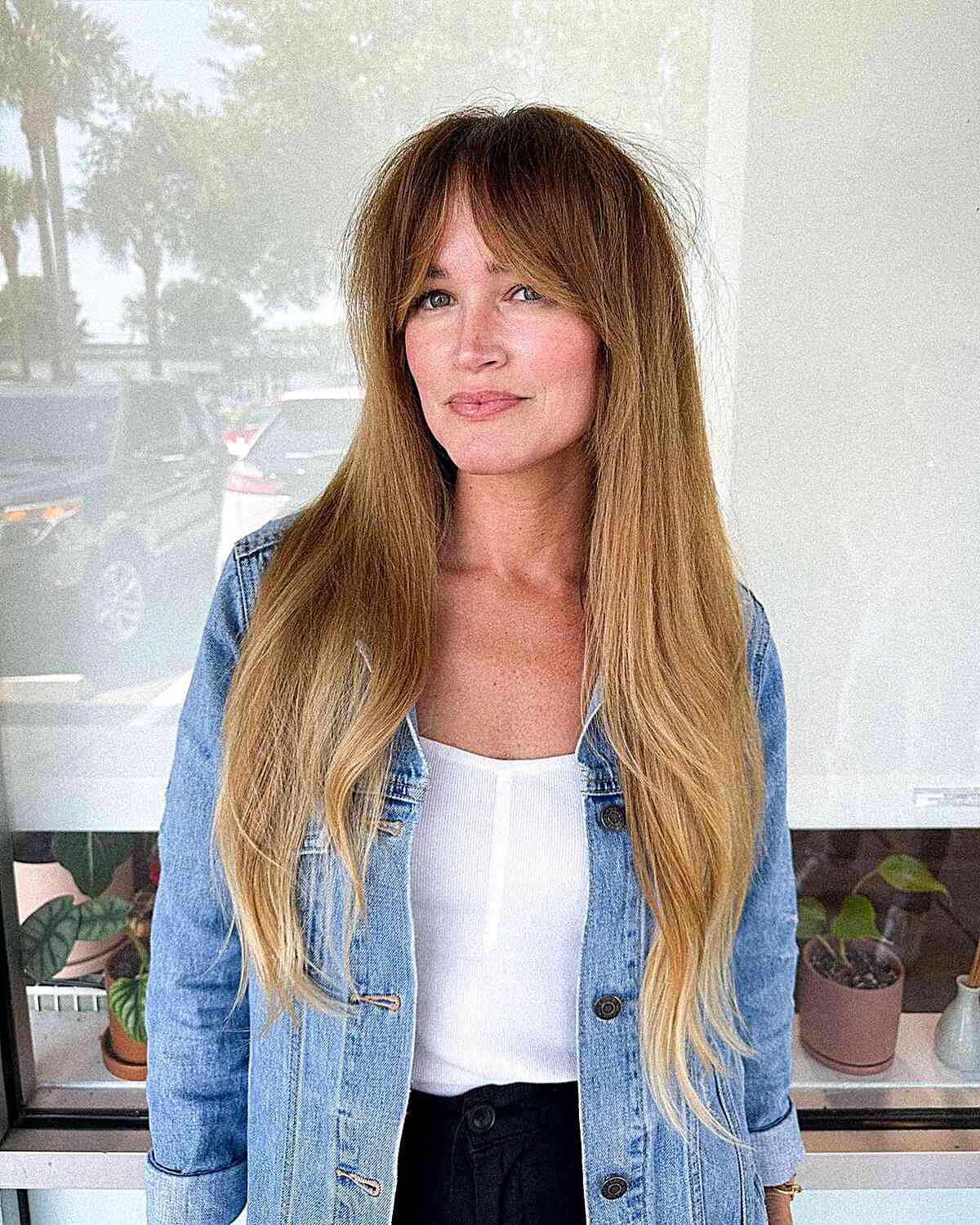 Curtain Bangs and Subtle Long Layers for mature ladies aged fifty