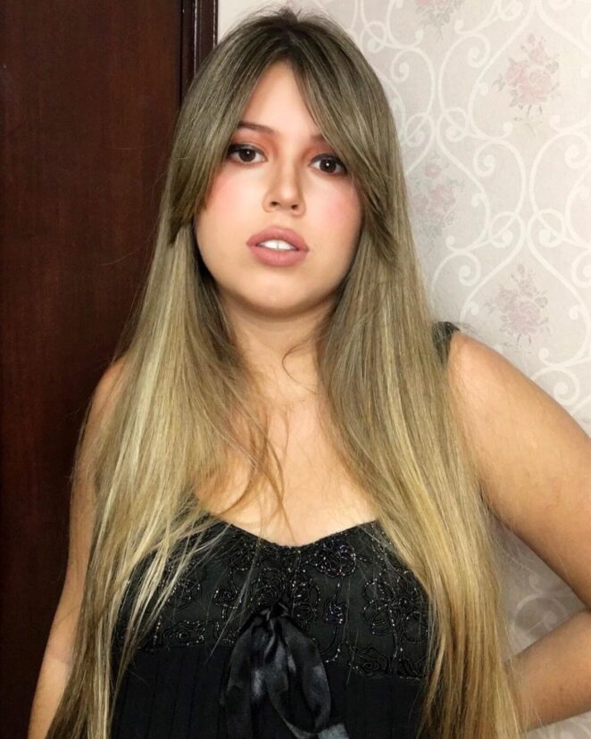 30 Best Ways to Wear Curtain Bangs for Straight Hair, According to Stylists