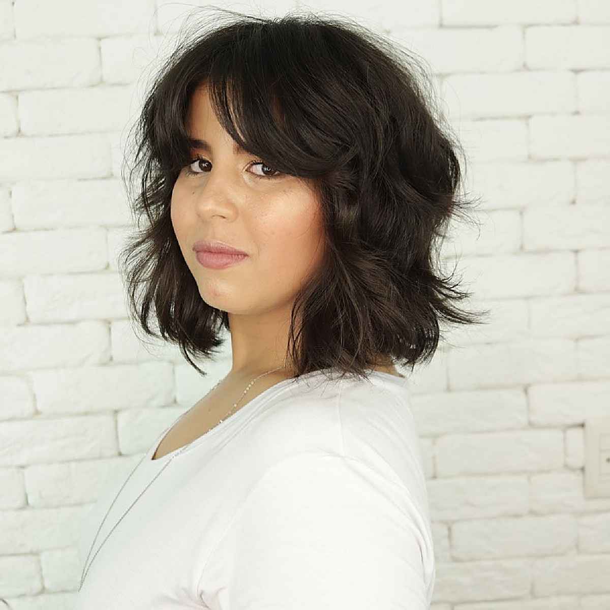 Curtain Fringe on a Long Bob for Women with Round Jawlines