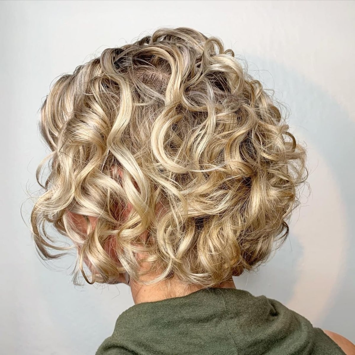 Cute before and after curly bob with layering