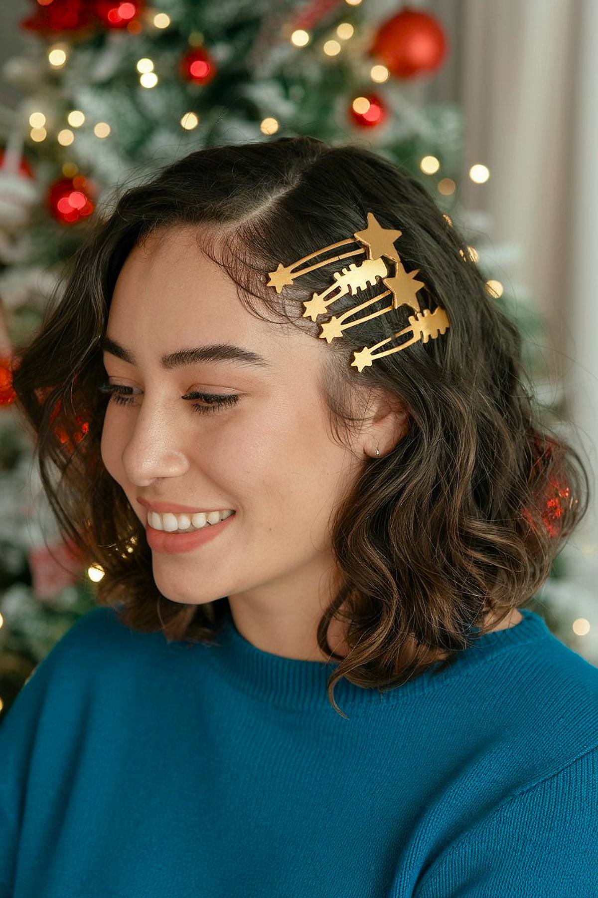 Wavy bob with gold holiday hair clips for Christmas