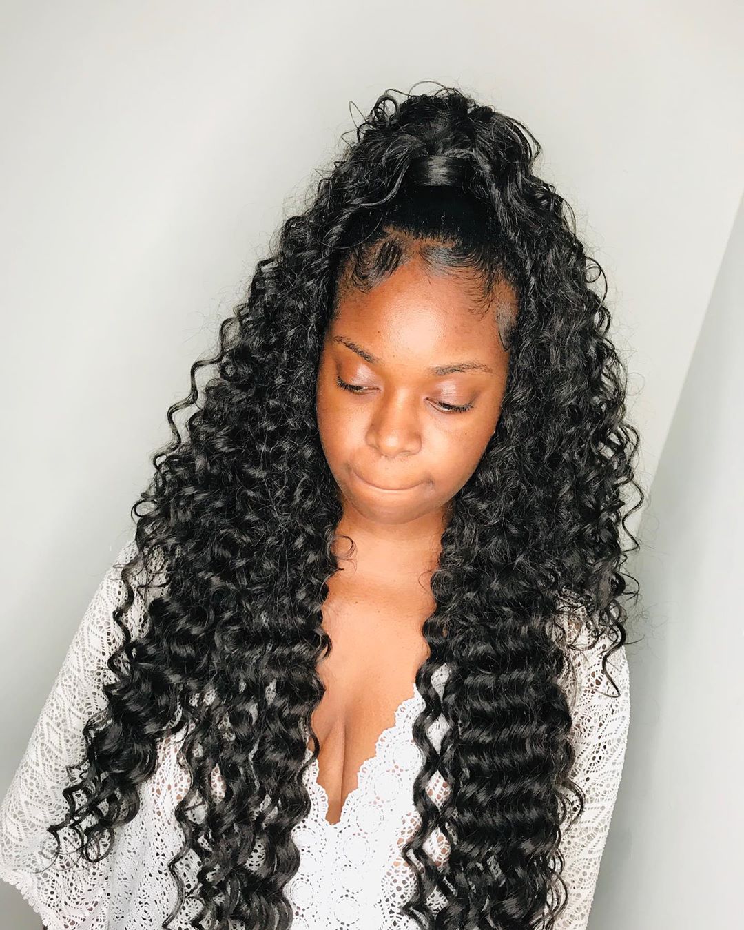 cute curly sew in hairstyle