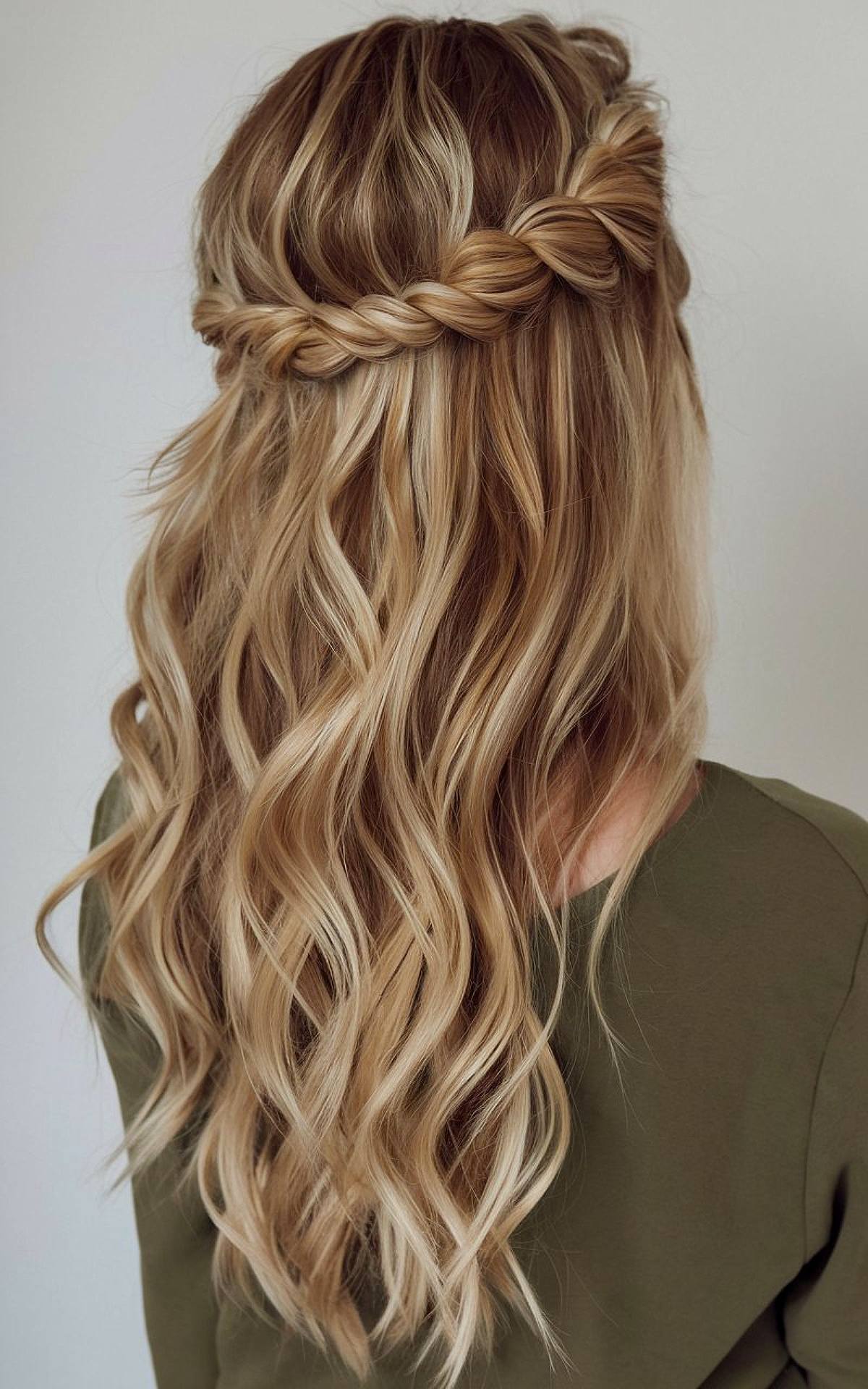 Twisted crown half-up hairstyle for long thick wavy hair