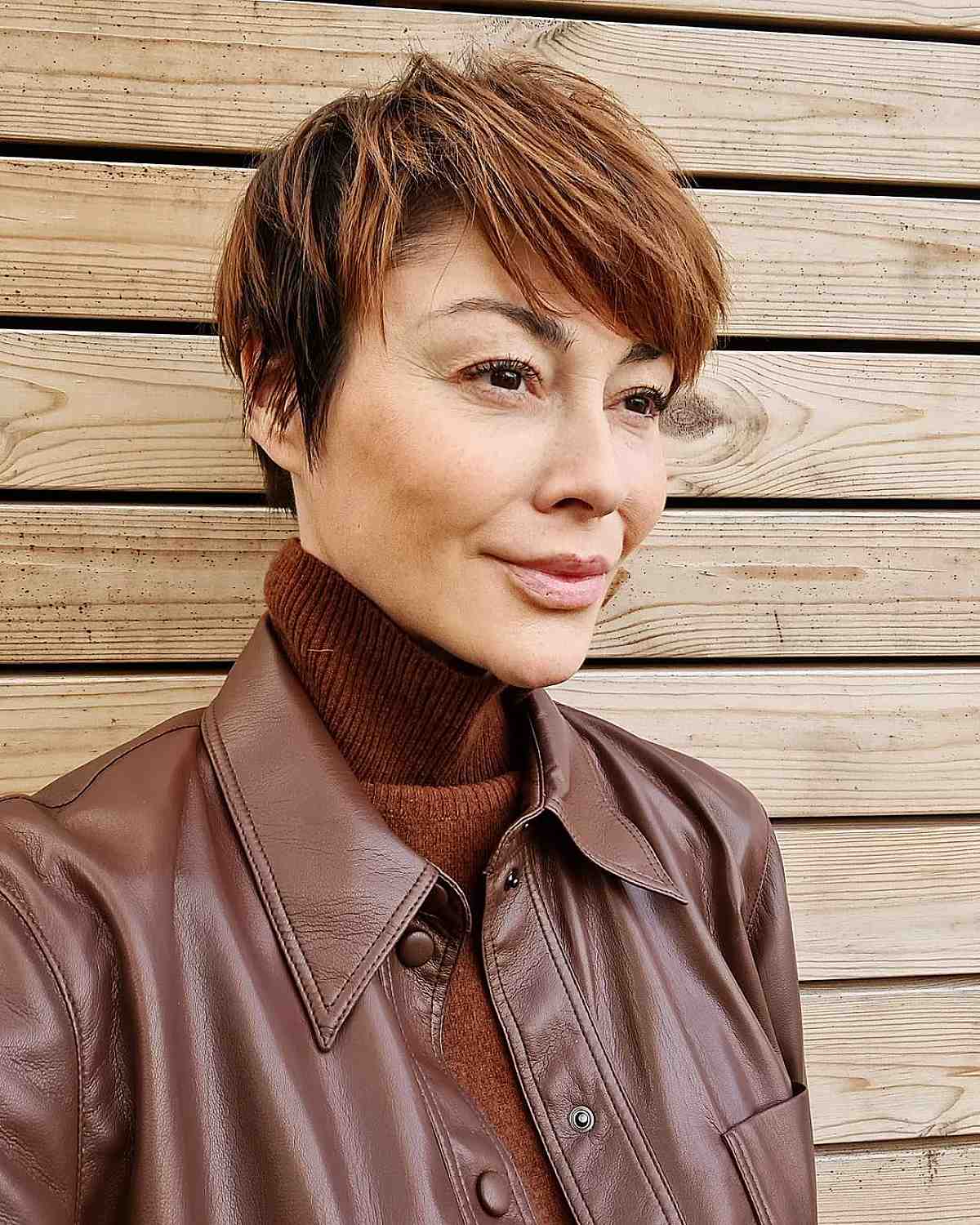 cute layered pixie with bangs for over 50