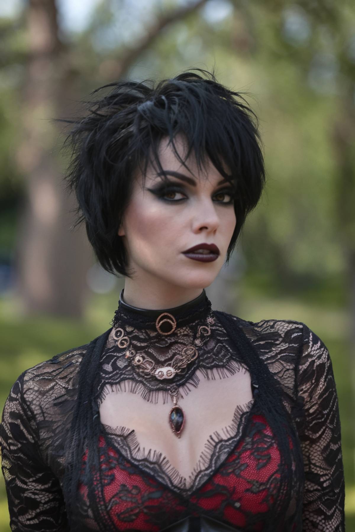 Short black emo hairstyle with textured layers, spiky ends, and choppy bangs