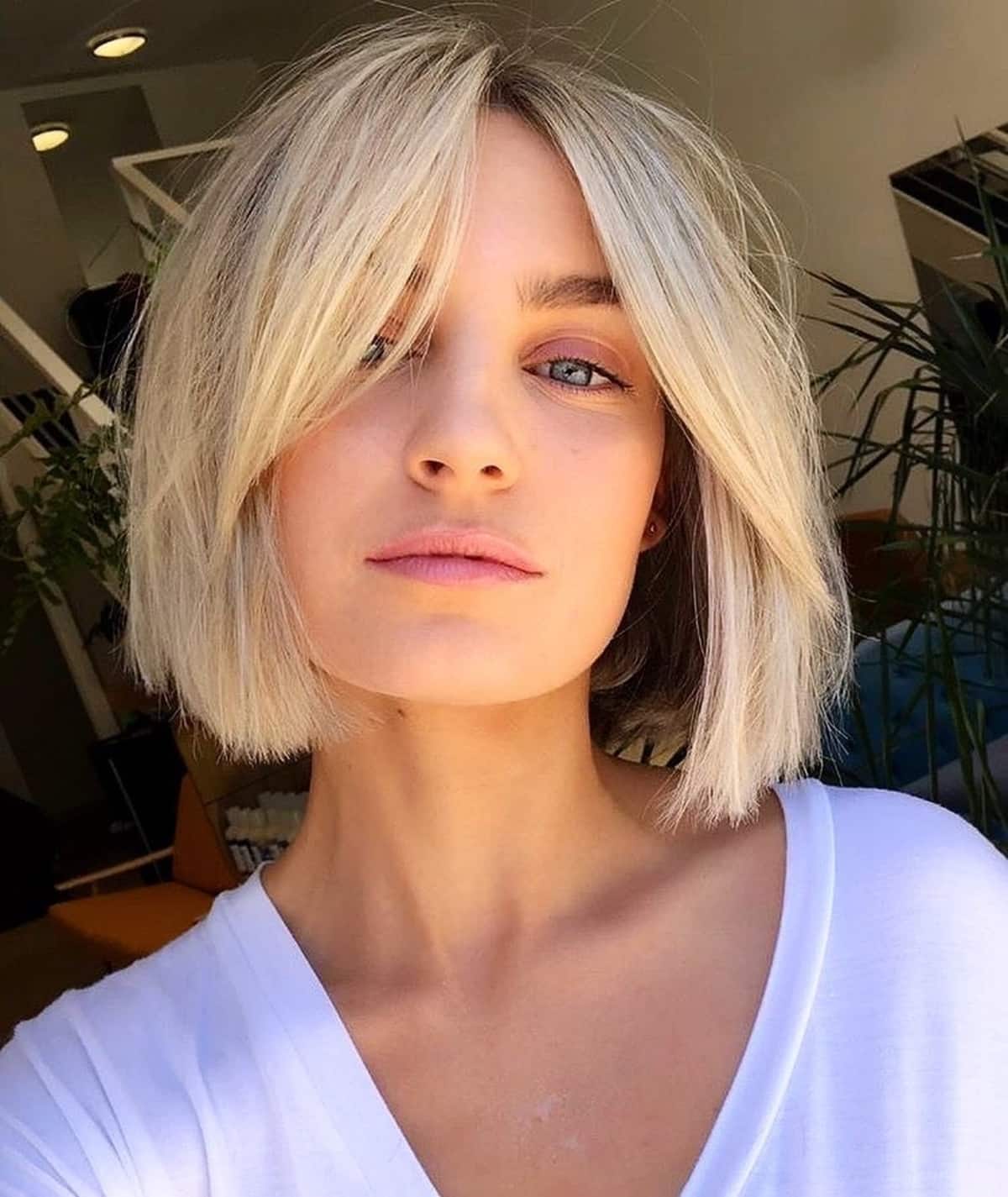 Cute Short Hair with Long Bottleneck Bangs for women with square faces