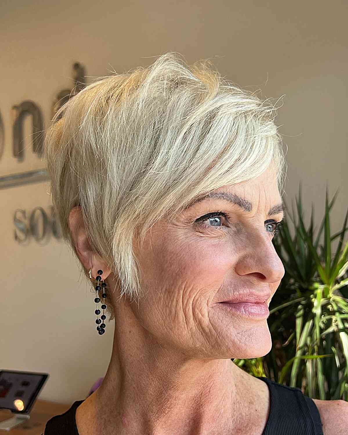 Cutest Shaggy Pixie Cut with Bangs for Ladies Aged 60