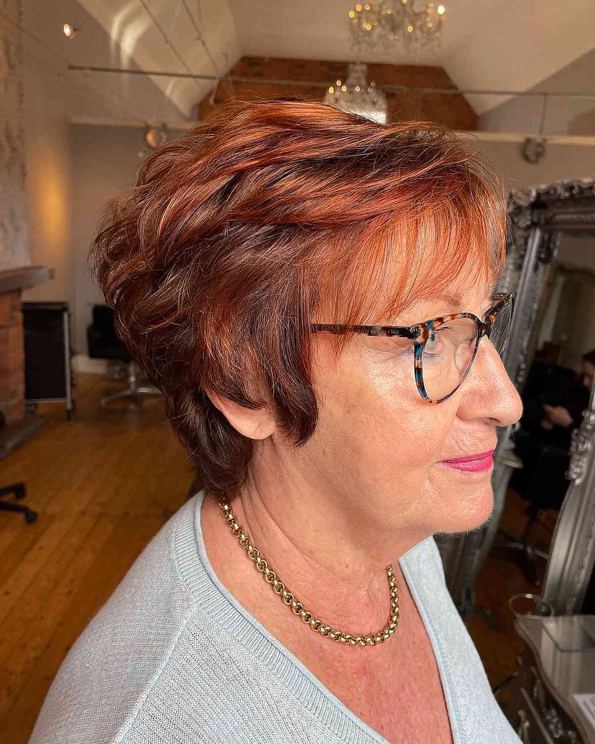Dark Auburn Feathered Bob for 60-Year-Olds with Glasses