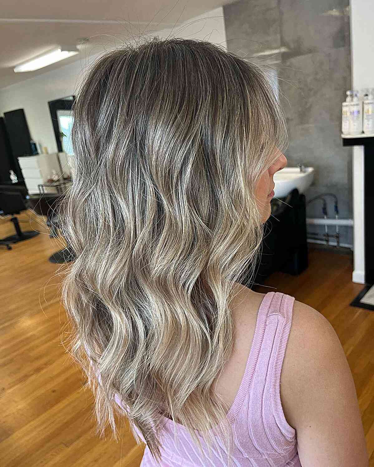 Dark Base with Ashy Dirty Blonde Balayage Tones for Layered Mid-Length Cut