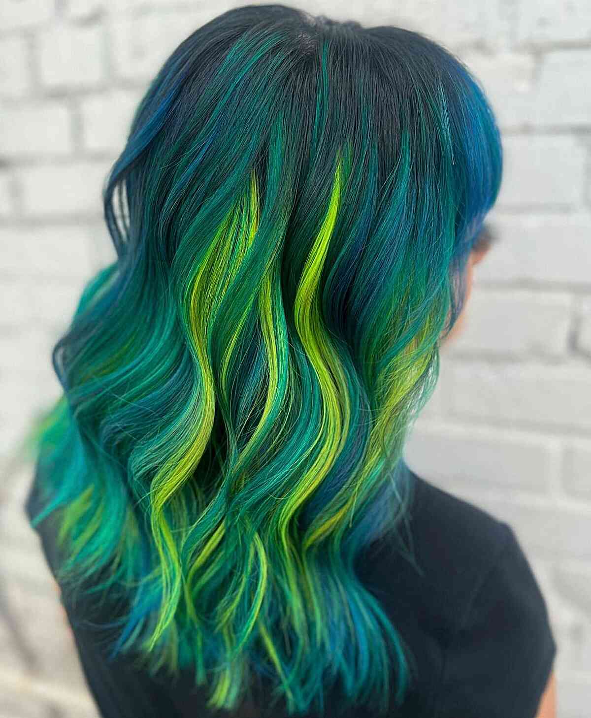 Dark Blue and Neon Green Streaks on mid-length hair for edgy women
