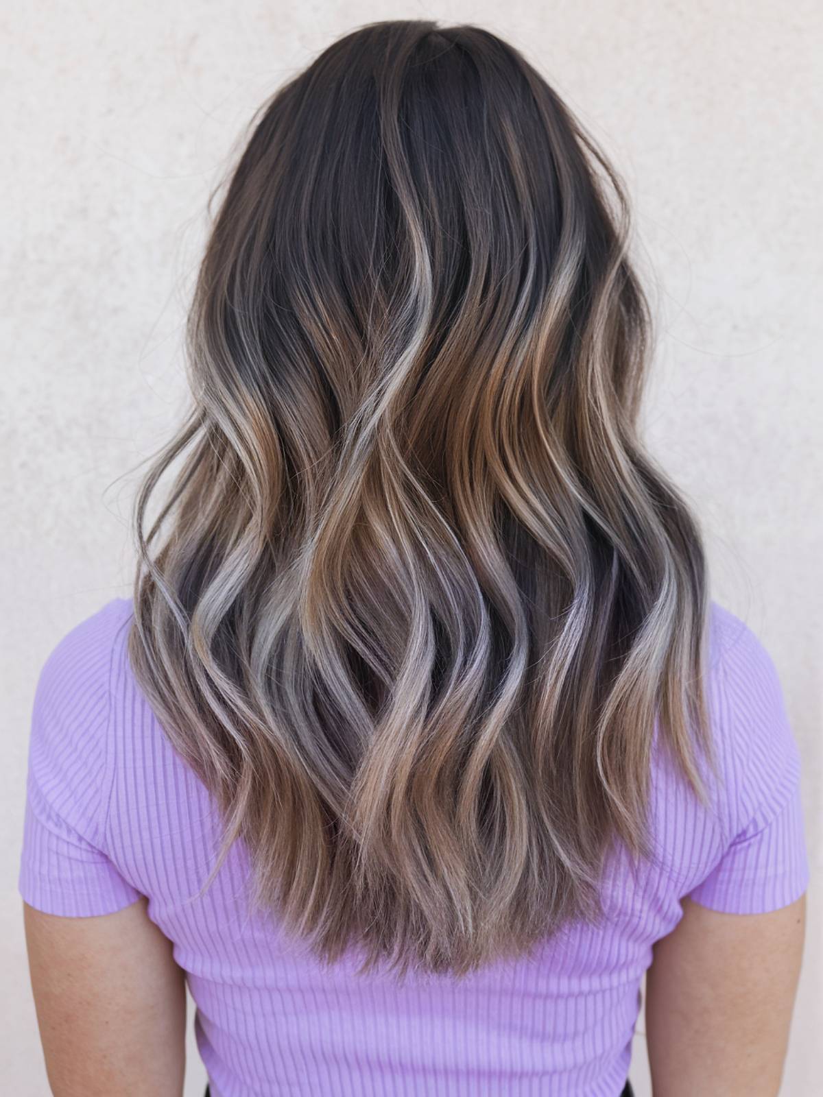 Dark brown hair balayage in cool tones