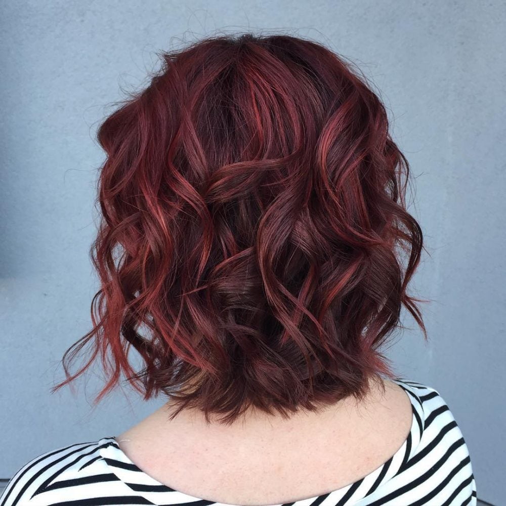 dark brown hair with red highlights