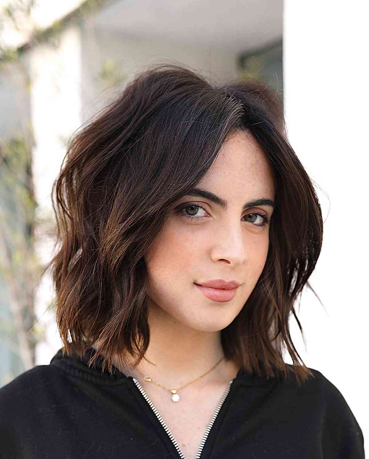 Dark Brown Textured Lob Cut with a Middle Part and no bangs cut at shoulder-length