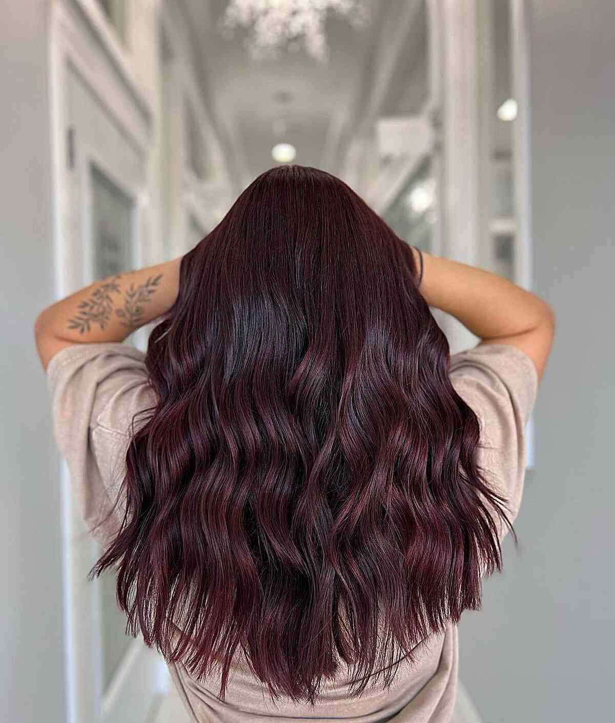Dark Burgundy Balayage Hair with Long-Length Soft Waves