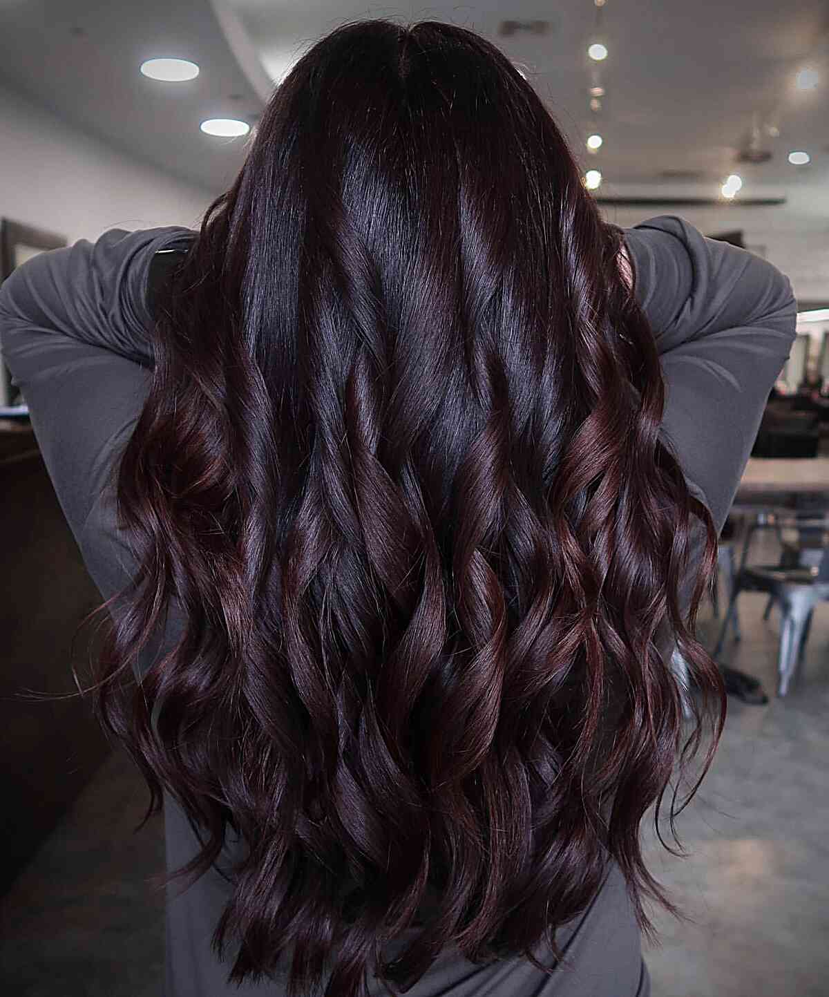 Dark Caramel Brunette with Highlights on long hair with barrel curls