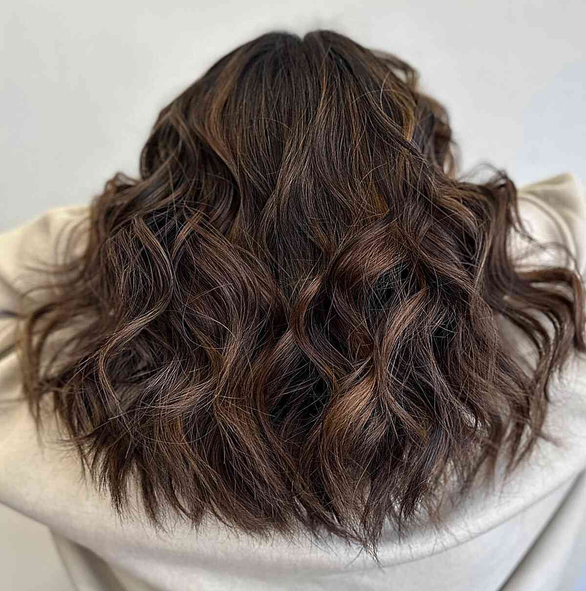 Dark Chocolate Brown Balayage Curls for Medium Choppy Haircut