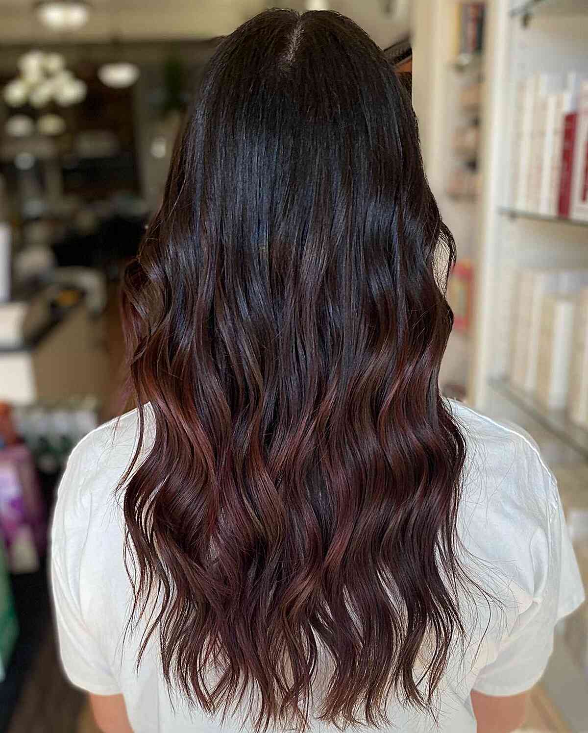 Dark Chocolate Burgundy Balayage Hair with Medium-to-Long Beach Waves