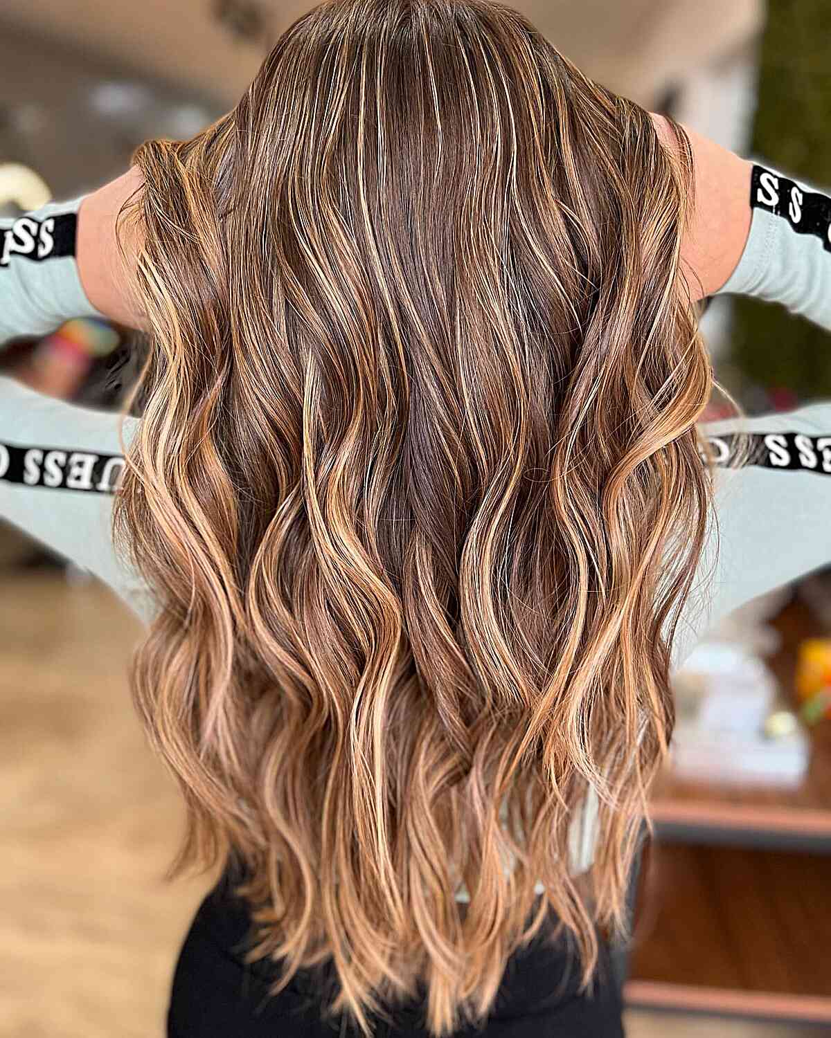 Long Wavy Dark Hair with Caramel Blonde Ombre Highlights