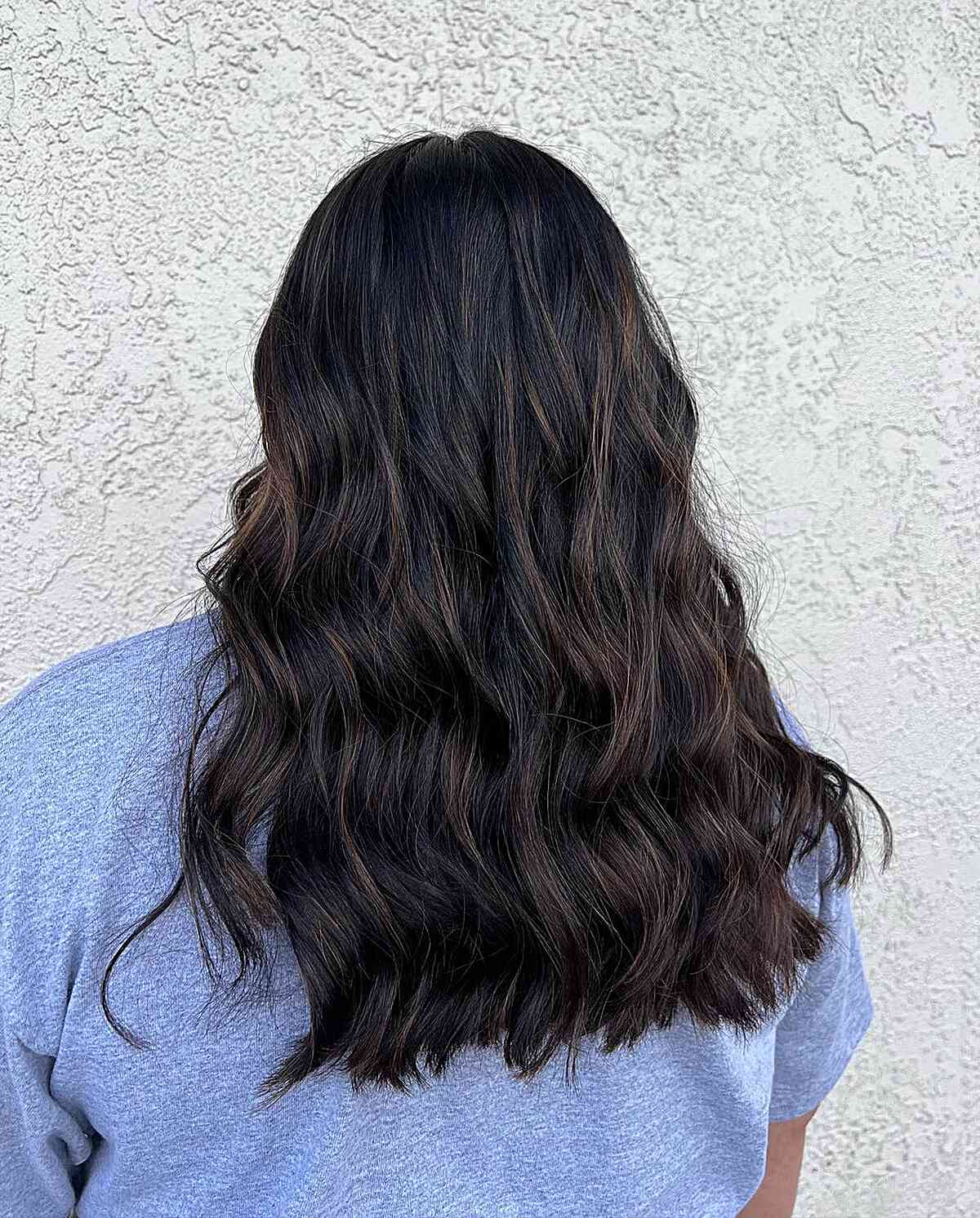 Long Wavy Dark Hair with Subtle Chocolate Partial Highlights