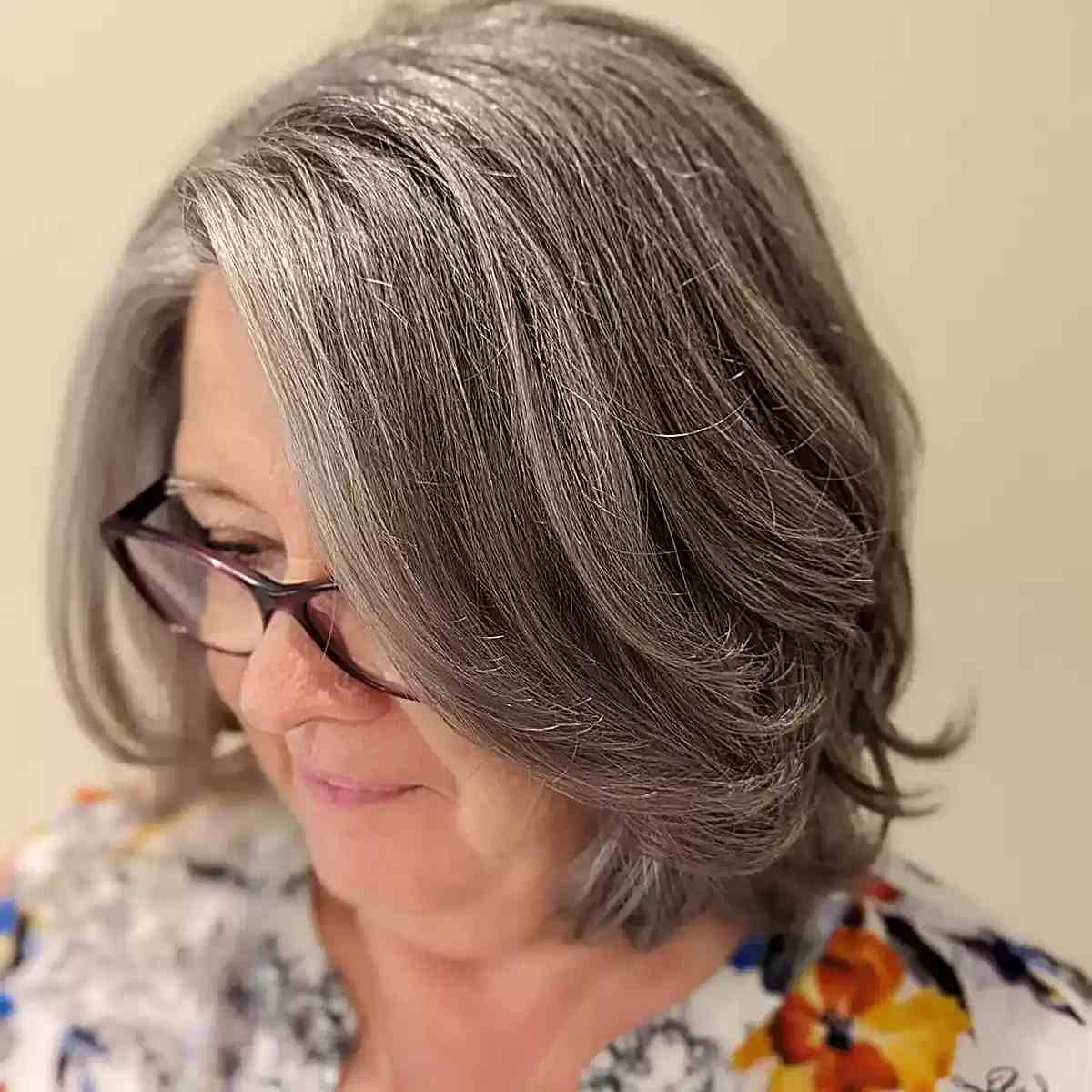 Dark Layered Lob with Soft Grey Blended Tones for Ladies Over 50