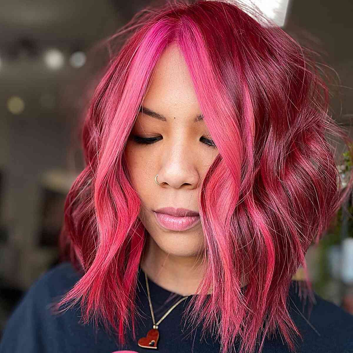 Dark Pink Lob with a Bright Pink Money Piece with choppy ends and no bangs