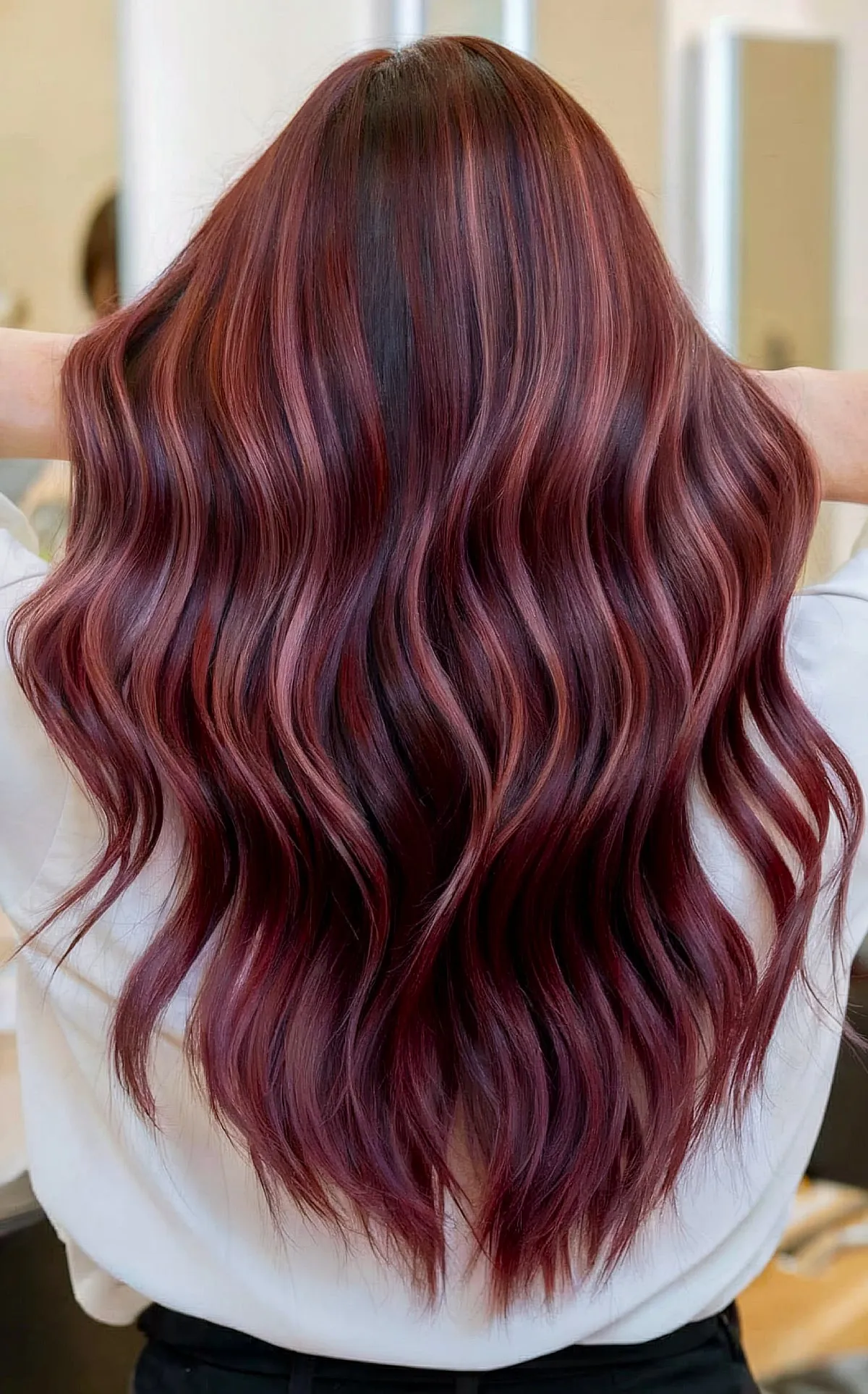 Dark Red violet hair color with highlights