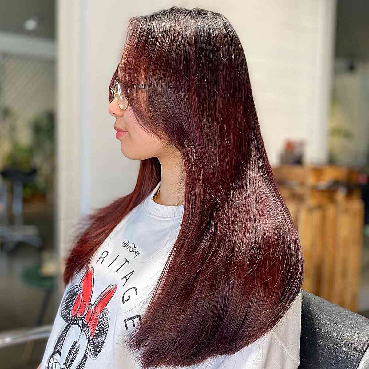 Dark-Rooted Burgundy Babylights for Long Hair with Face-Framing Layers