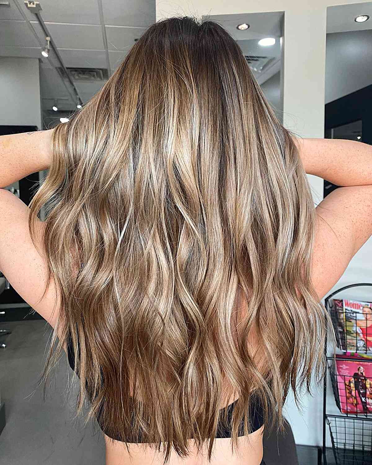 Dark-Rooted Glossy Bronde Balayage for Long Hair with Loose Waves
