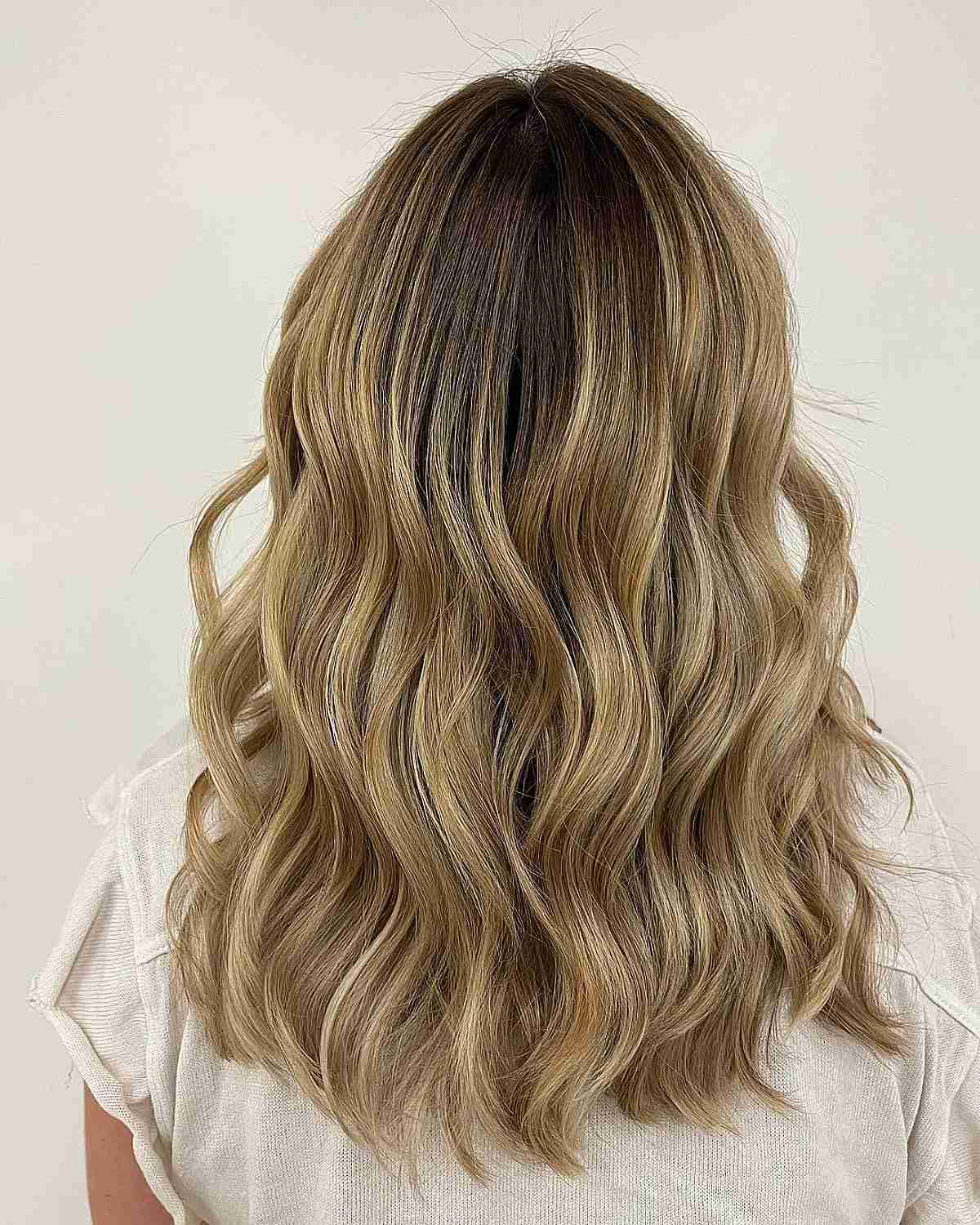 Dark-Rooted Warm Buttery Blonde Balayage