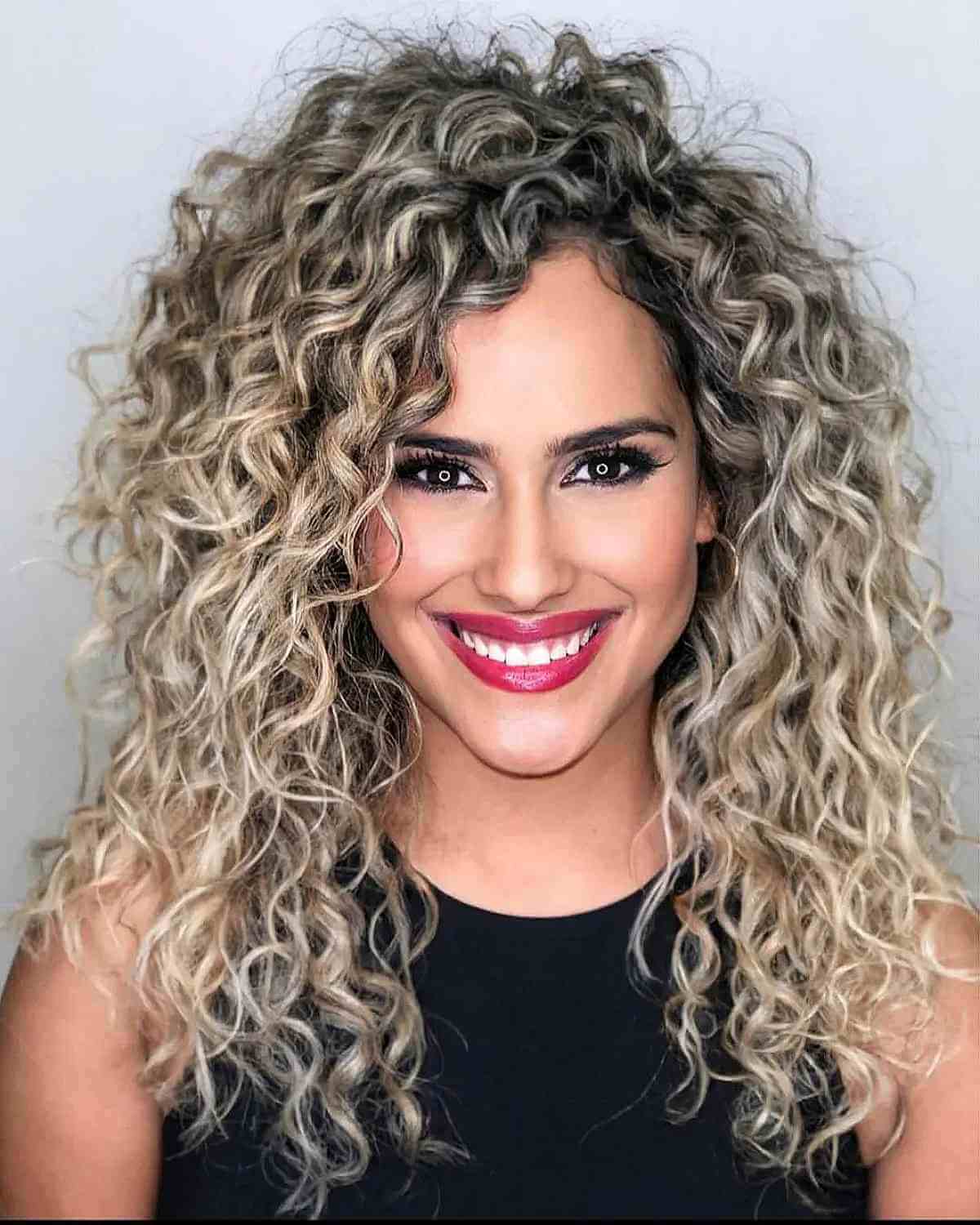 Dark to Light Blonde on Long Curly Hairstyle