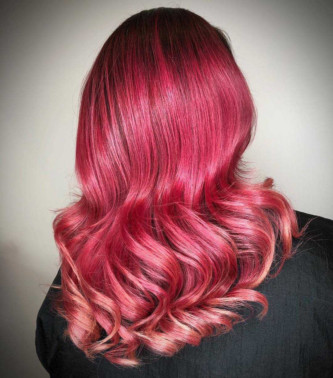 Dark to light pink ombré hair