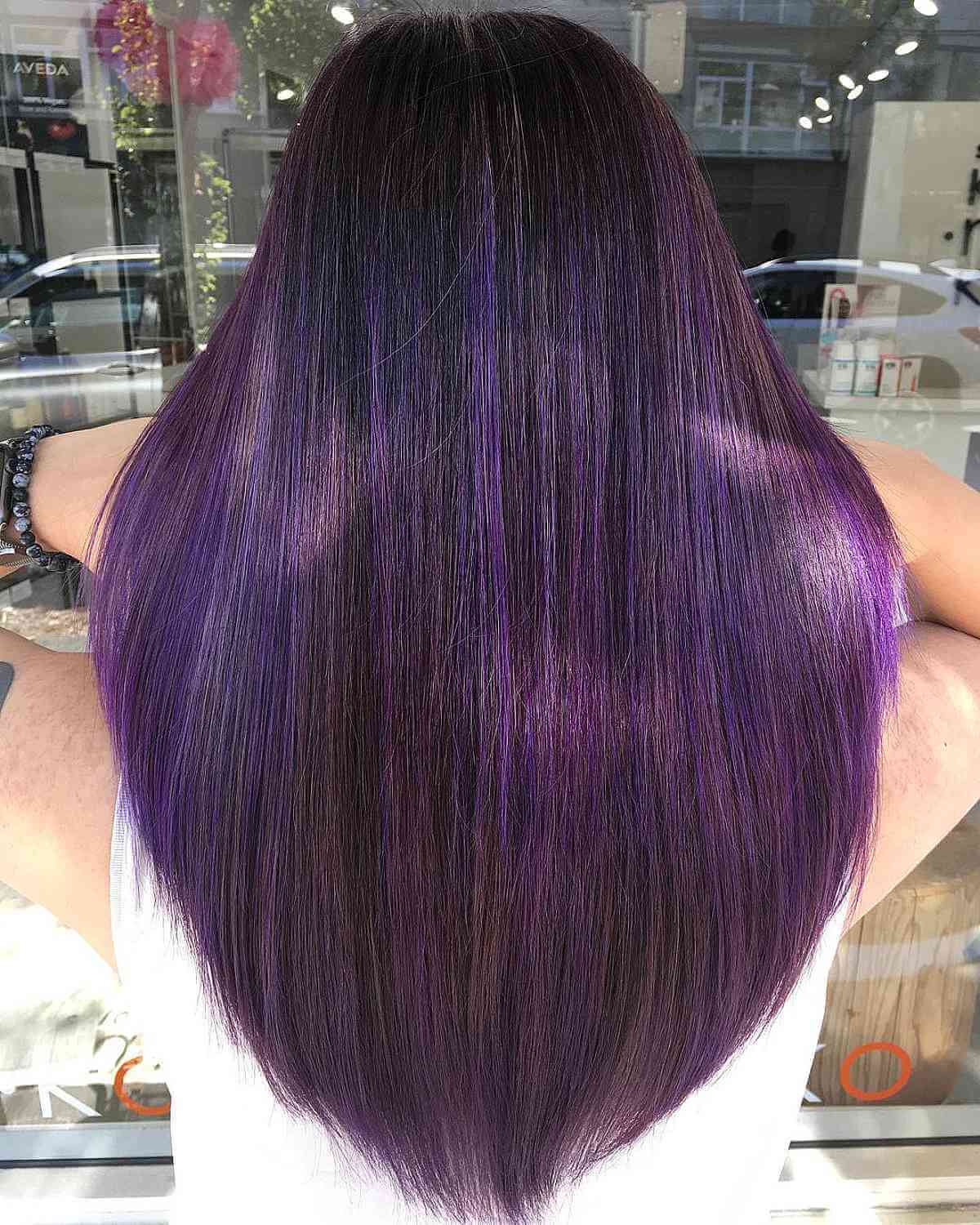Dark V-Cut Hair with Purple Highlights