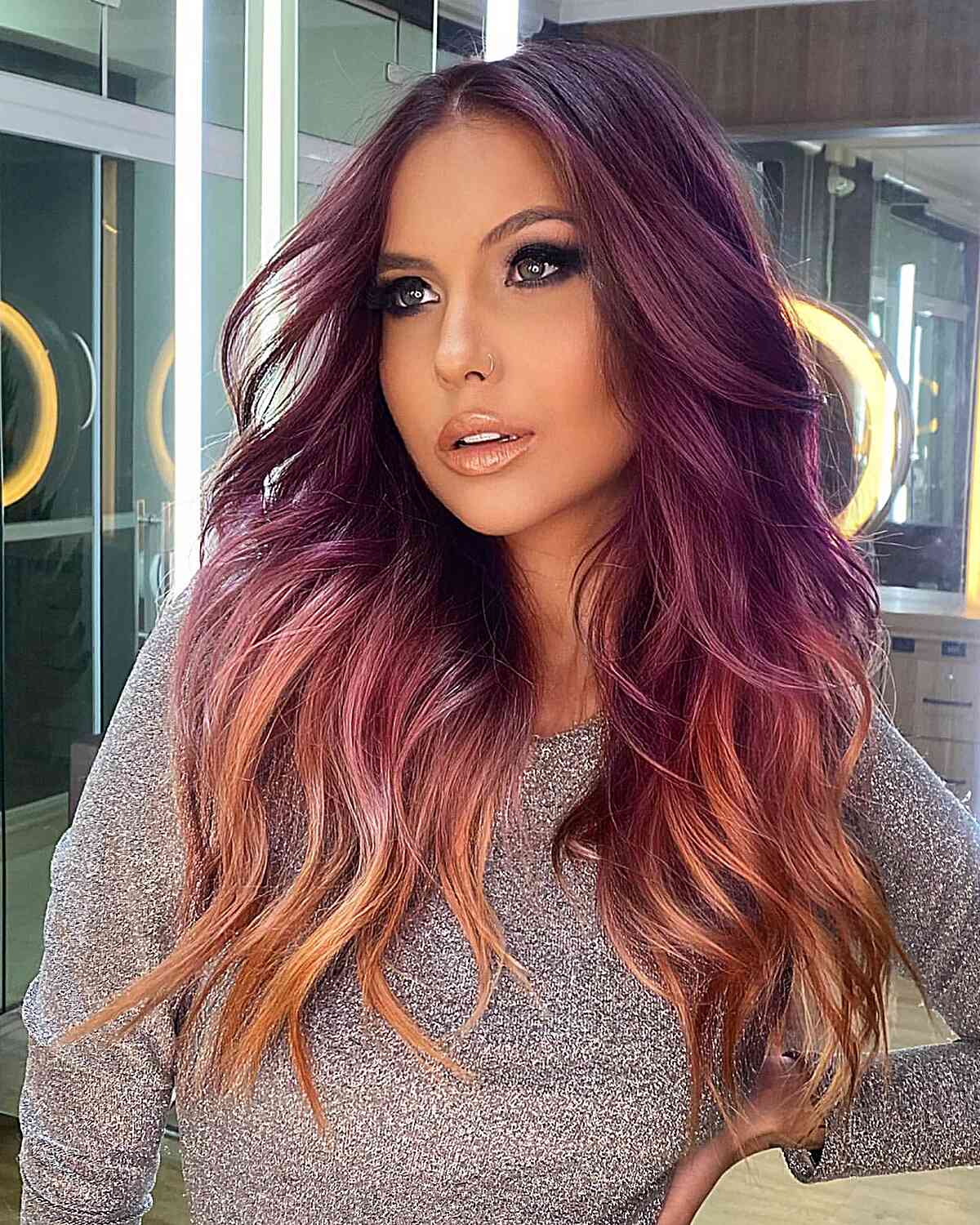 Dark Violet to Light Orange Ombre hair color for women with long hair