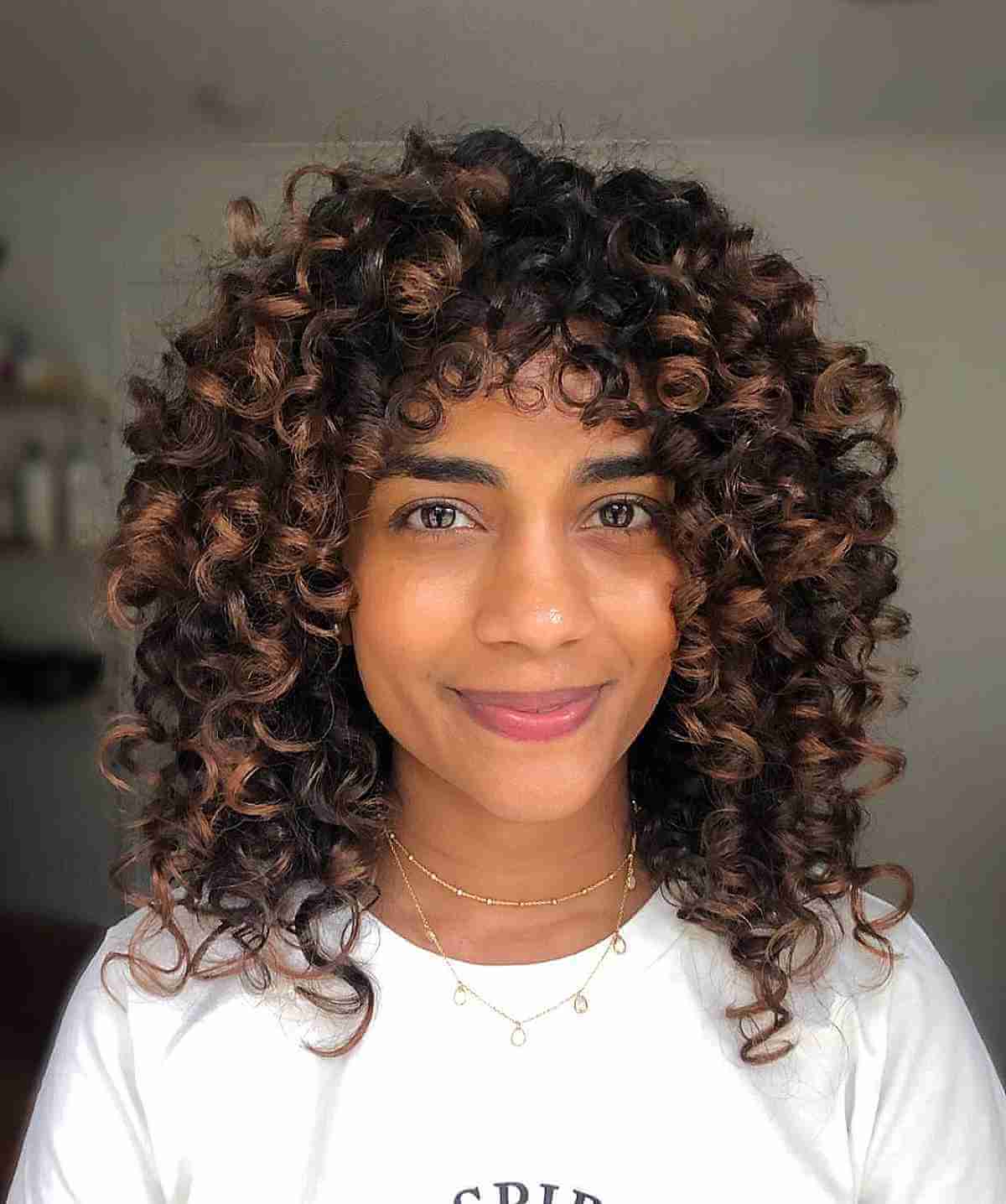 Deep Caramel Balayage on Brunette Curly Hair