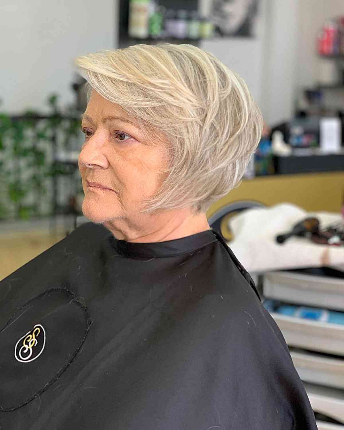 Deep Side Part Short Jaw-Length Hair with Choppy Layers for Seniors Over Sixty