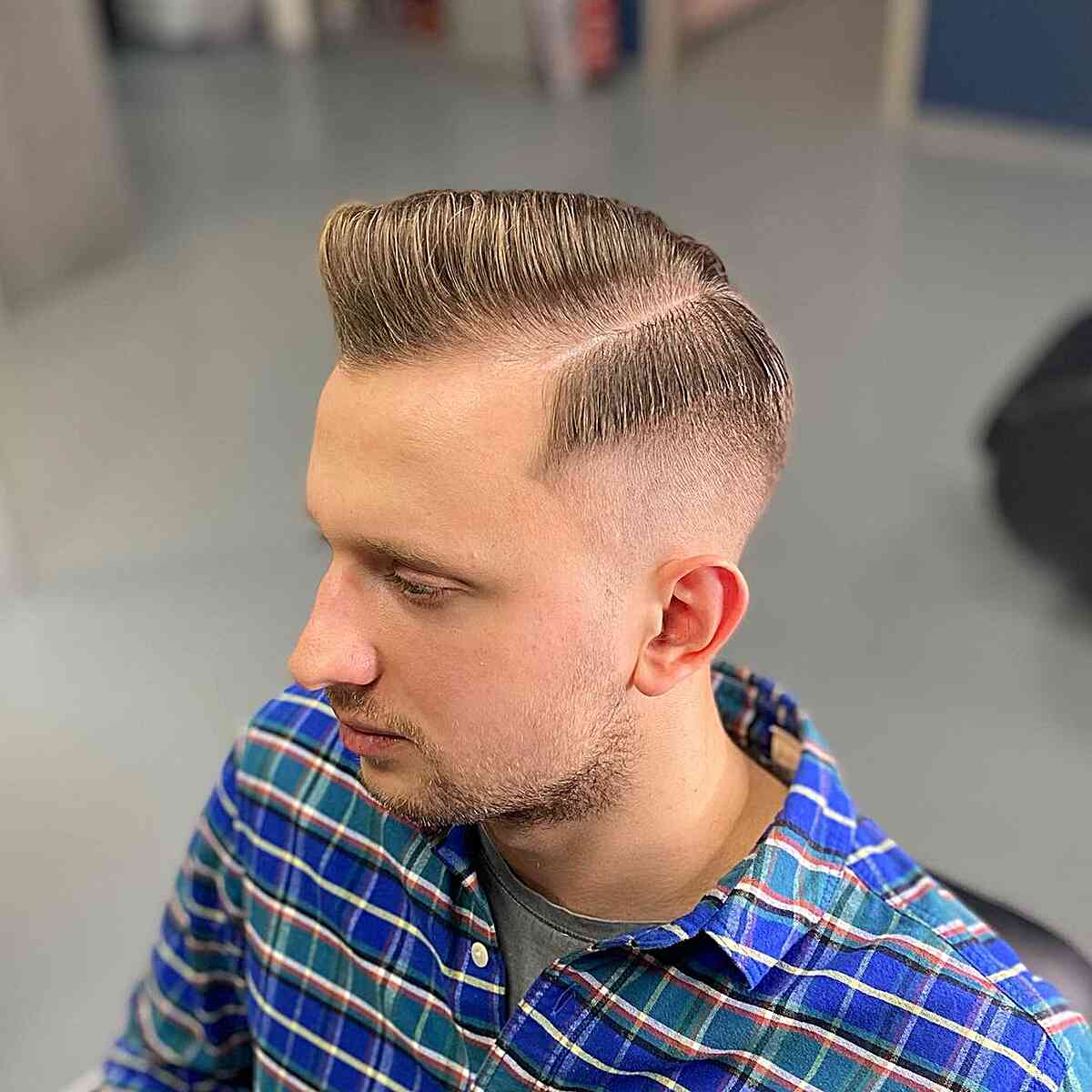 Deep Side Part with a Mid Fade for Guys with Thin Hair