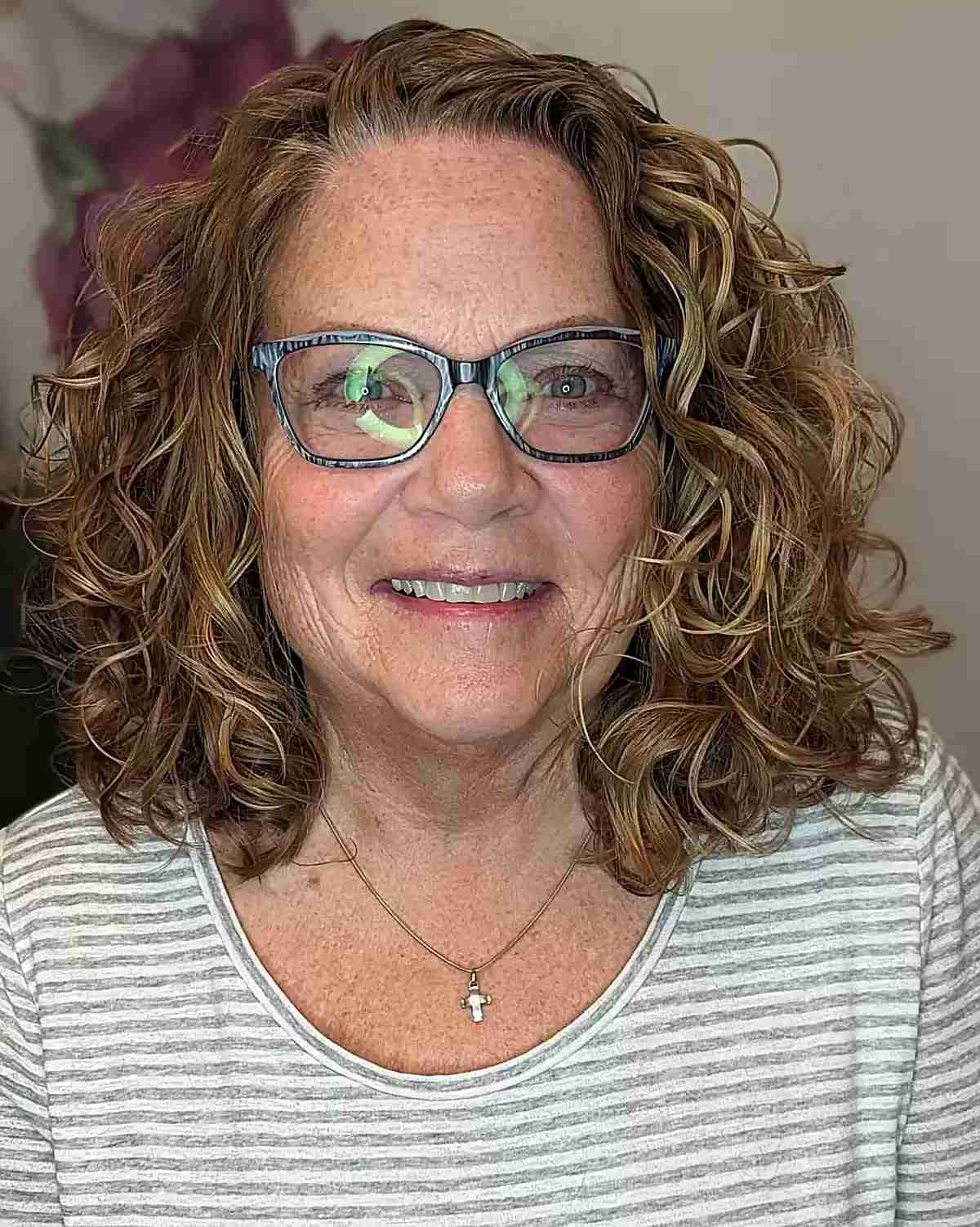 Defined Loose Curls for Women Over Sixty with Glasses