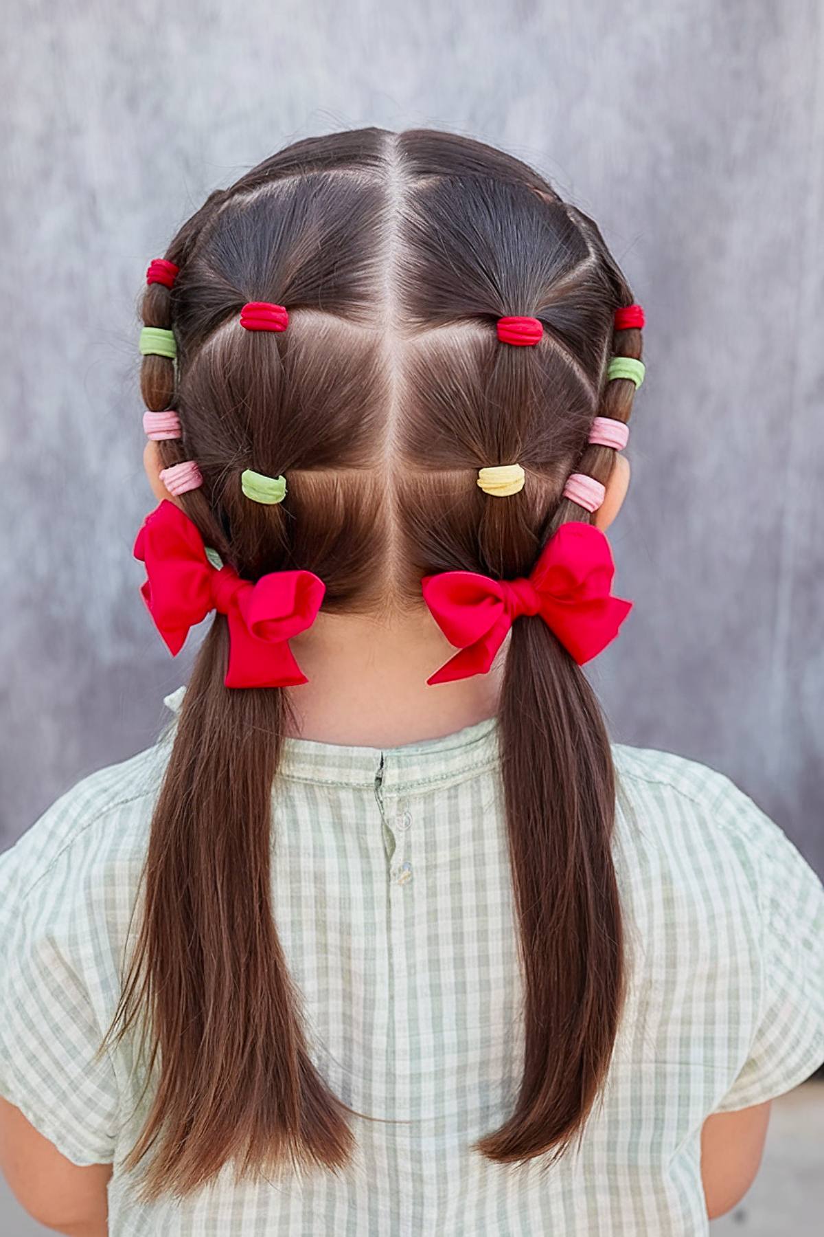 Side braid toddler hairstyle with a big bow