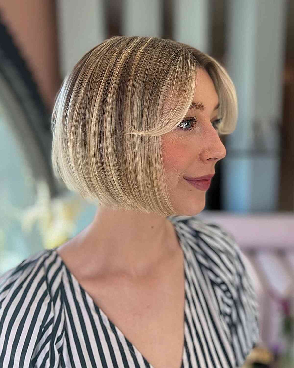 Dimensional Blunt Bob with Ombre Balayage and Bangs for women in their 40s