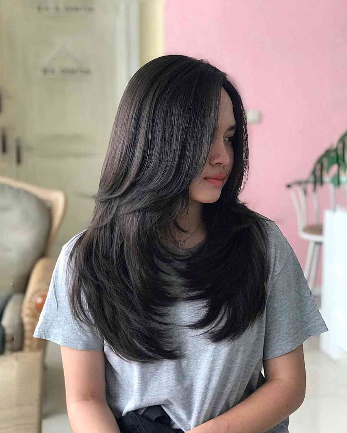 Long-Length Dimensional Butterfly Haircut for Dark Tresses