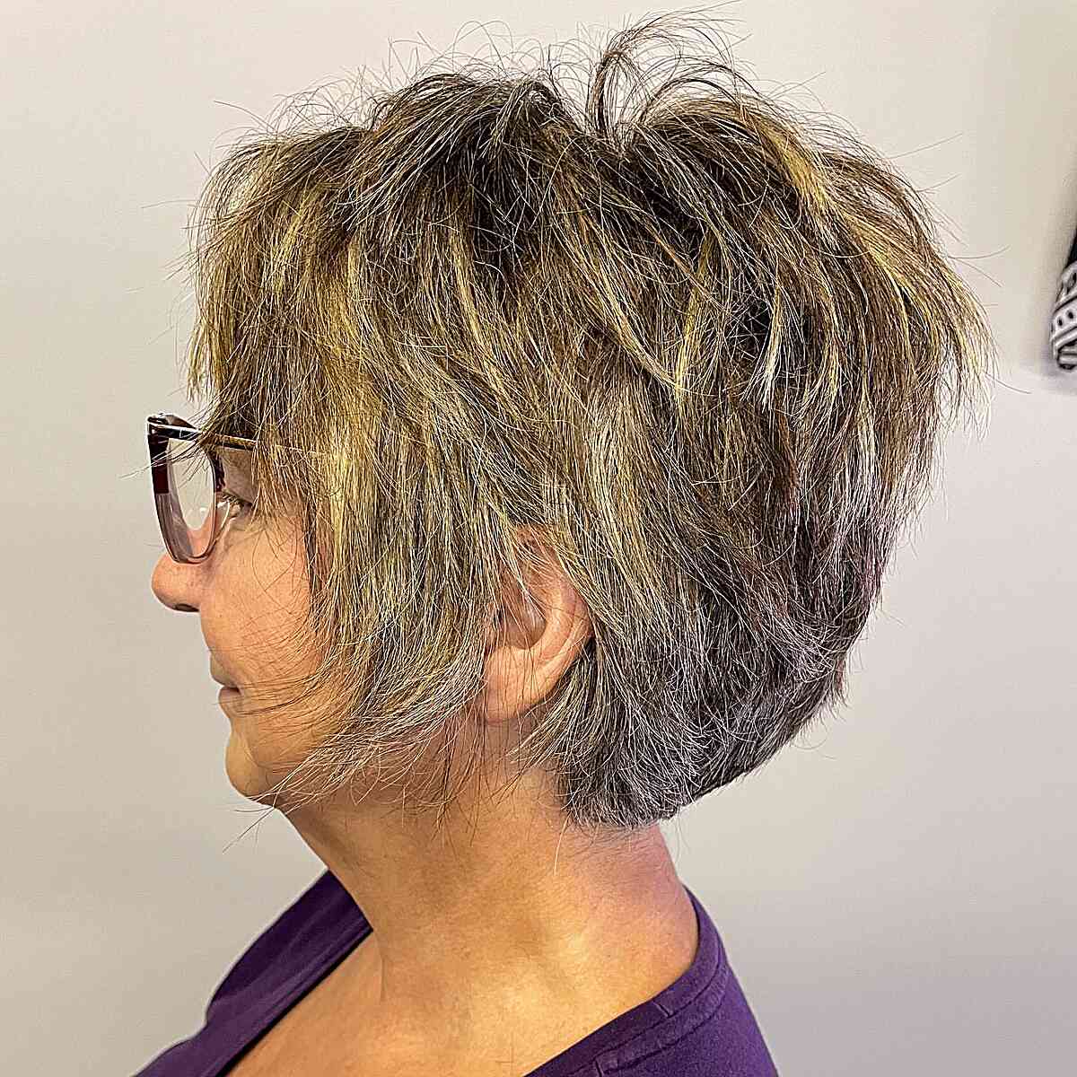 Dimensional Choppy Pixie Bob with Short Layers on Women Over 60 with Glasses