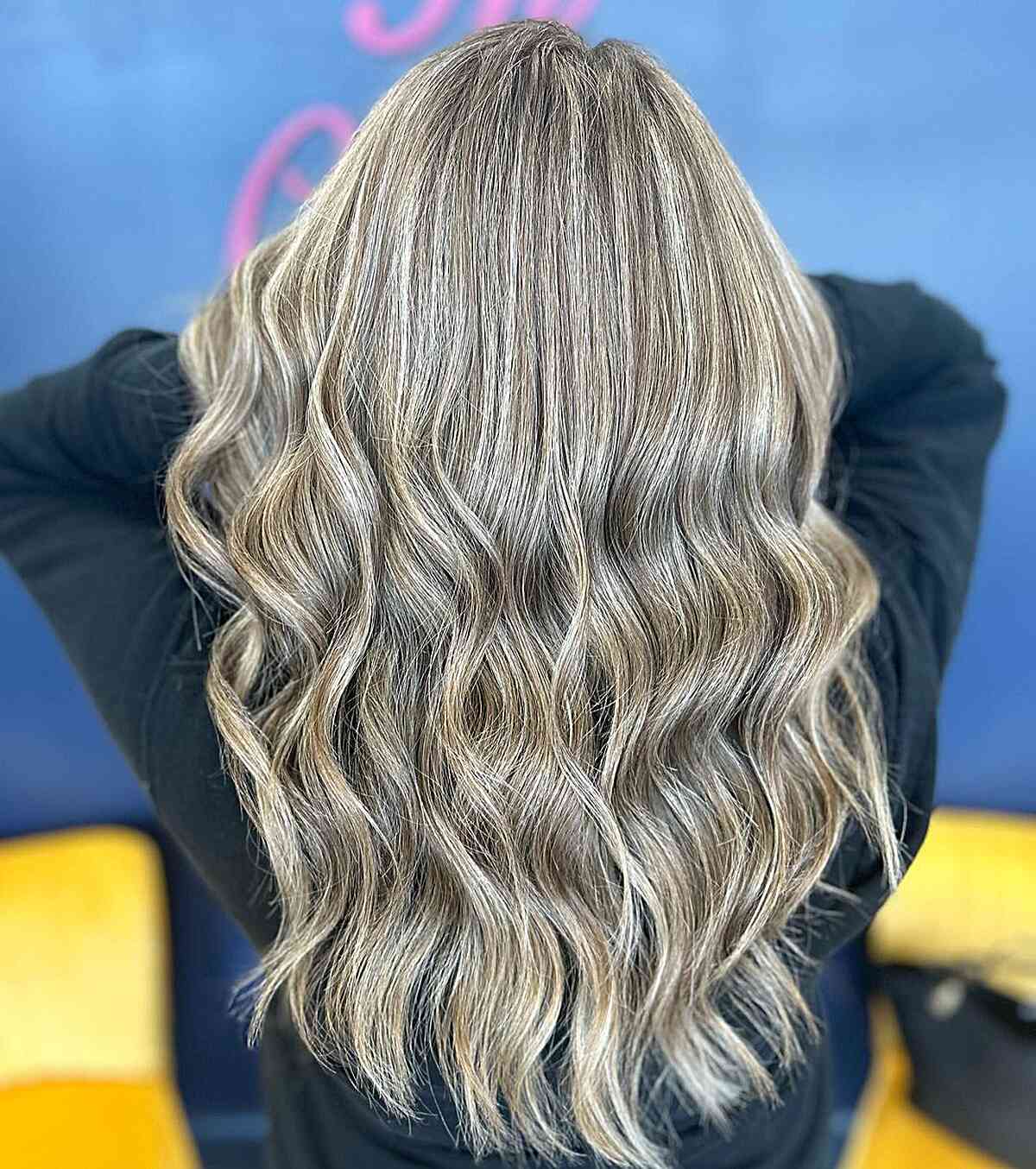 Dimensional Icy Blonde Balayage Highlights and Lowlights with Long Waves and Layers