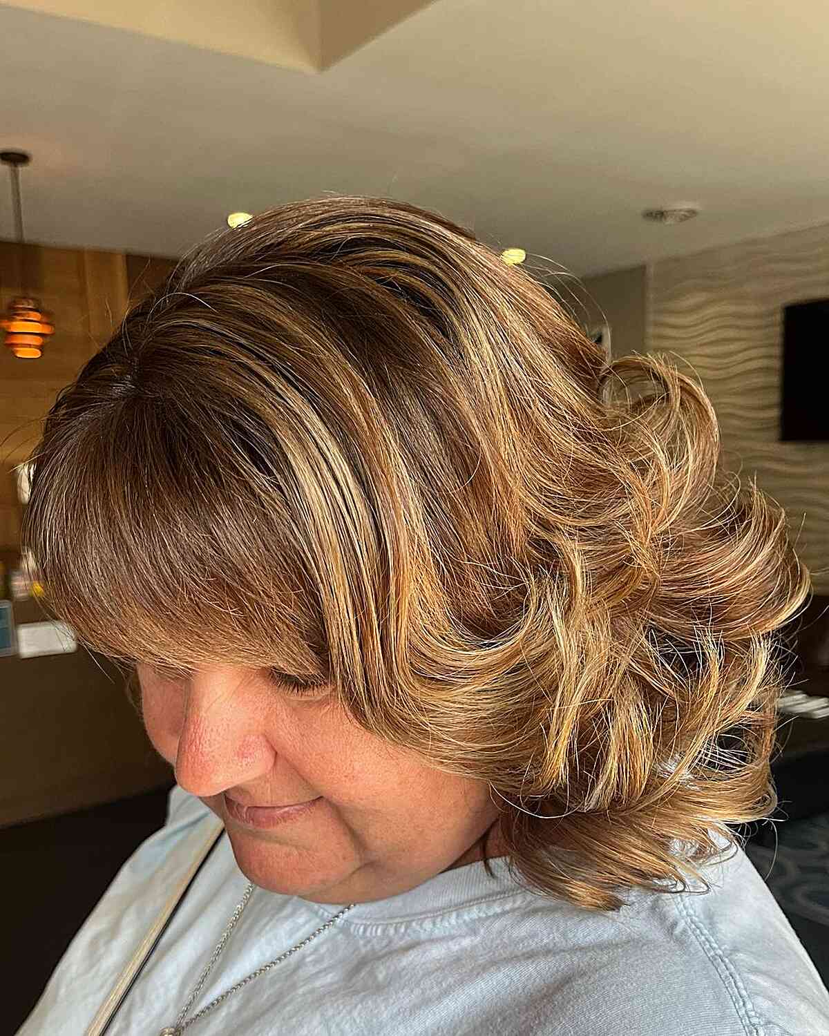 Dimensional Layered Cut with Curled Ends and Bangs for Plus-Size Older Ladies Over 50