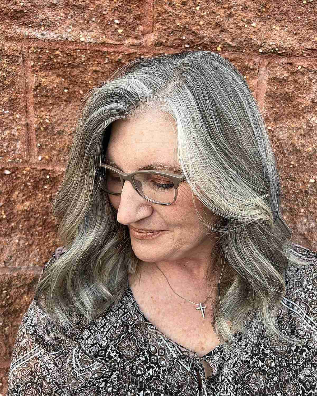 Dimensional Medium-Length Grey Hair with Loose Waves for Old Women