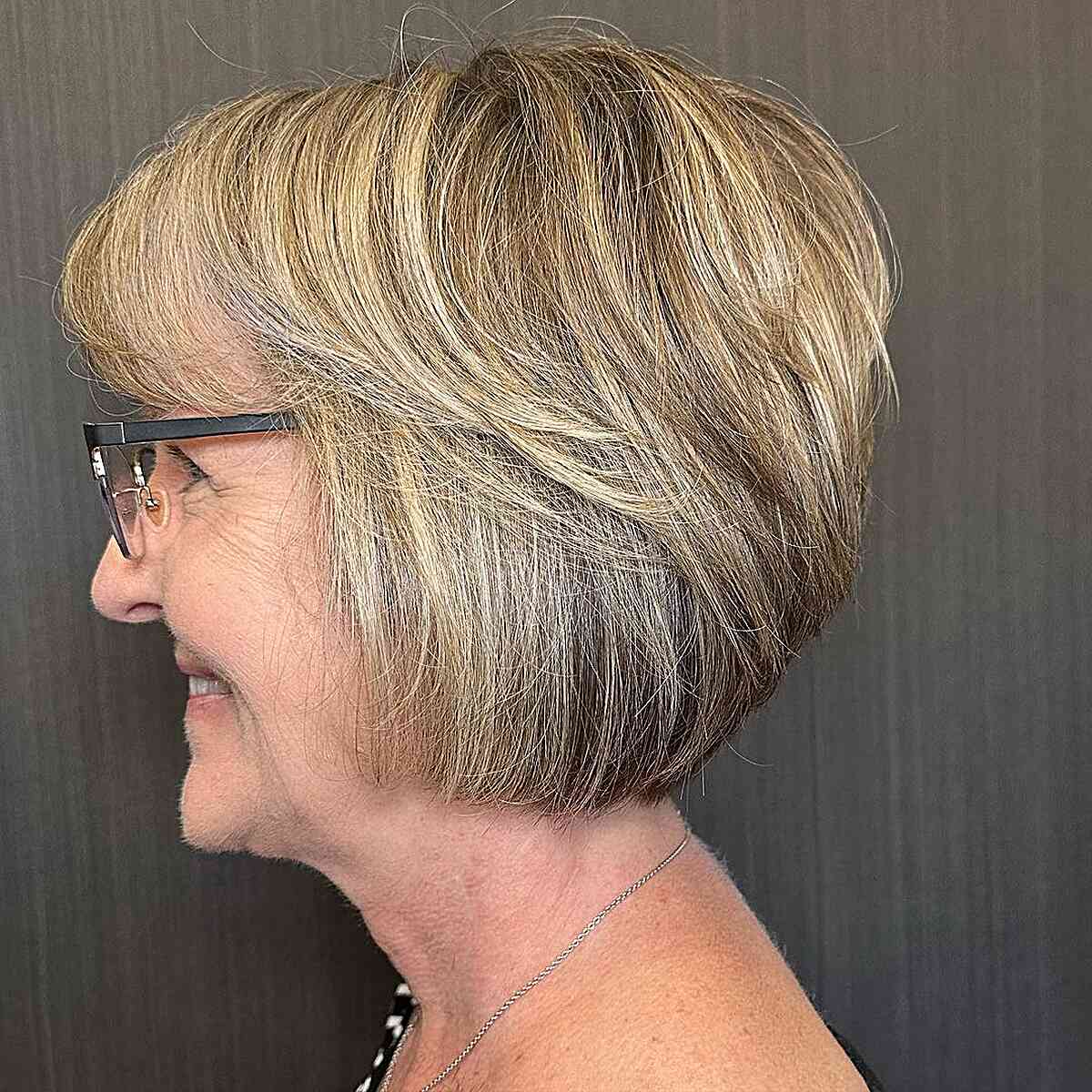 Short-Length Dimensional Stacked Graduated Bob with Swoopy Bangs