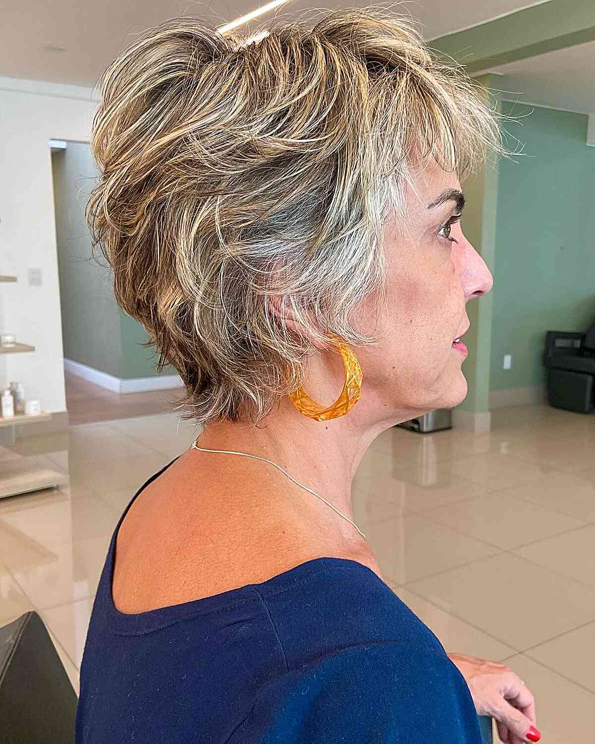 Dirty Blonde Balayage on a Pixie for Ladies Over 50